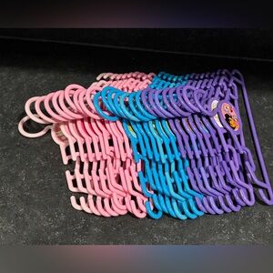 25 pc Disney children’s clothing hangers with Disney characters